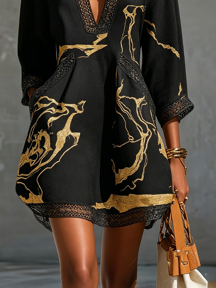 Fortuna | Robe mini noire avec broderies dorées