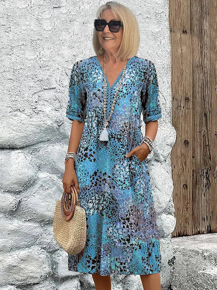 Suzanne | Robe midi vibrante à couvrance ventre élégante
